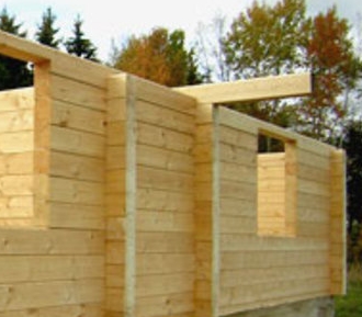 Строительство домов из деревянного бруса: в чем его преимущества?